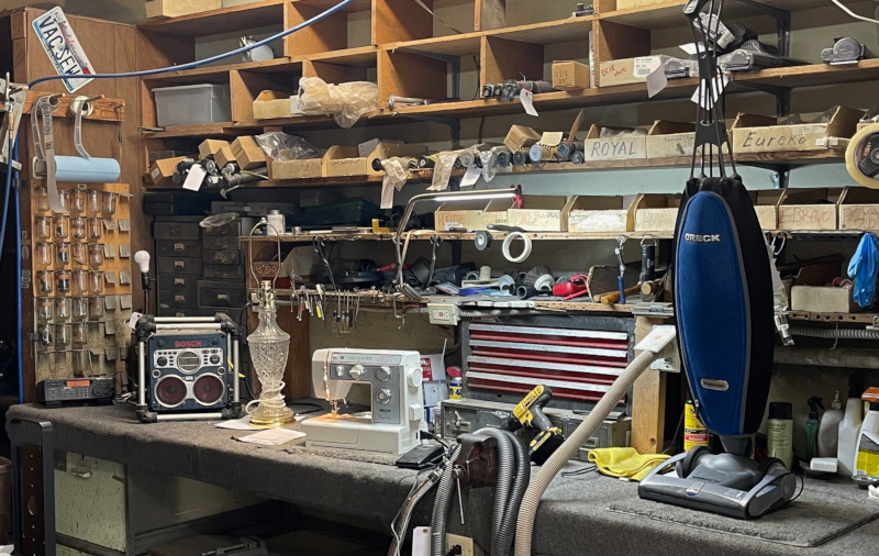 Our work bench where we bring your vacuum cleaner or sewing machine back to life